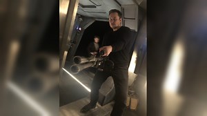 Elon Musk Holding a Minigun | Know Your Meme