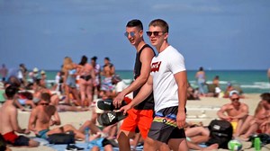 Experts fear virus variants will join travelers over spring break