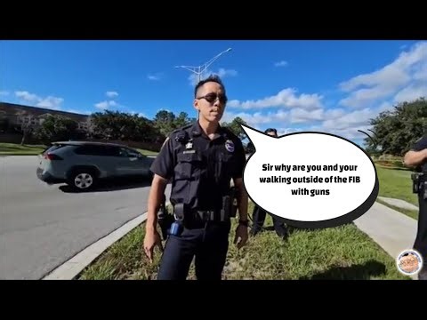 Frauditor and friend audit with guns outside of the FBI