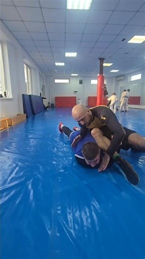 Sliding Omoplata from a maut into aCrippler Crossface choke