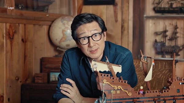 Ke Huy Quan plays with new Lego Goonies set