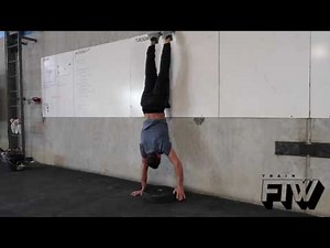 Handstand Plate Step ups