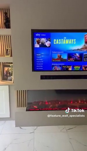 💥Another fantastic Bespoke Feature Wall added to our portfolio💥 This Feature wall was completed in 2 days start to finish, below is a list of what was included in this project: ✅ Extended False Chimney Breast Wall ✅ TV Recess and Soundbar Recess ✅ Award Winning 150rw Onyx Avanti (3 sided) Electric Fire ✅ Oak Acoustic Panelling ✅ Bespoke Storage Units With Shaker Style Doors ✅ 4 x Floating Shelves ✅ 2 x Ceiling Bulkheads ✅ 12 x Dimmable Spotlights ✅ 1 x Dim Switch ✅ 2 x Double Sockets Behind Th