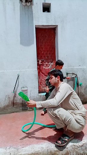 Controlling Water Flow with a Garden Hose Outdoors