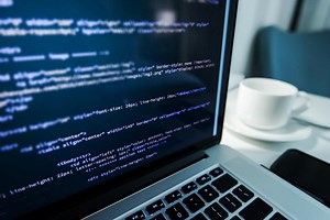 How Close Are Smart Contracts to Impacting Real-World Law?