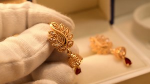 7.3K views · 152 reactions | Gold polish earrings with small shiny crystals❤️ 5 year color warranty Code : en-2 Free home delivery #earrings #ring #goldplated #gifts #Pakistan #freedelivery #quality #crystal #zircon #Lahore #karachi #Islamabad #zircon #jewelry #trending #share #shopping #quality #gold #peace #peacock #style #Peshawar #trending #Free #fashion #Lahore #quality #delivery #share | Meerzah.pk | Facebook