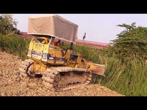 Powerful Dozer in Action: Earthmoving and Land Clearing.
