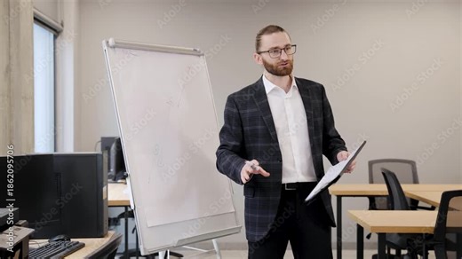 Bearded man in a suit presenting complex data and charts on a flip chart, teaching business concepts to professionals