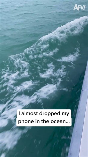 Phone almost went swimming with the fishes, literally! 🤣 #afv #fail #funny