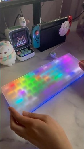 How the rainbow pom jelly keycaps look like with the lights and under the acrylic case
