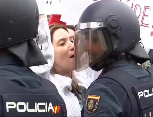 She was against the government but her husband was a police cop