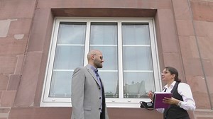 Business man and woman greeting each other outdoor before a meeting - Free Stock Video