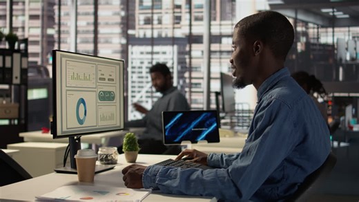 Business Person Working on Computer in Modern Office | Premium Stock Video Footage