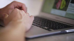 Person browsing on Facebook - Free Stock Video