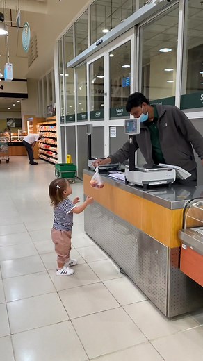 Toddler's Playful Grocery Store Adventure