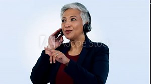 Call center, studio or senior woman with headset in communication, talking to help in customer service. Blue background, virtual assistant or mature sales agent with microphone in CRM or tech support