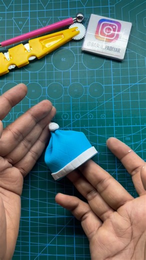 Chef Bablu Padiyar | Fondant Artist | Cake Artist | Sugercraft on Instagram: "How To Make Fondant Baby Hat | Fondant Winter hat Tutorial @bablu_padiyar #fondanthat #fondantwinter #cakeartist #cakestacking #bakerylife #cakedecorati... See more"