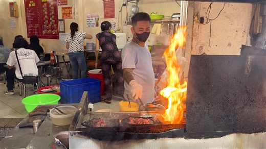 Forget everything you know about steak and eggs — Vietnam takes it to another level. I tried bò né, Vietnam’s sizzling take on steak and eggs, and it’s pure magic. Served on a hot iron plate with beef, sunny-side-up eggs, pâté, and a crusty bánh mì on the side, this dish is full of flavor, texture, and street food soul. #VietnameseFood #BoNe #SteakAndEggs #VietnamStreetFood #VietnamEats | Strictly Dumpling