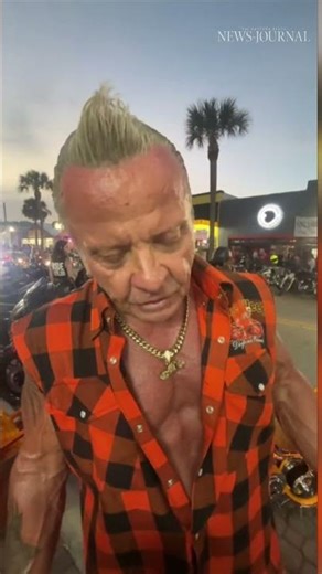 Biker shows off motorcycle at Daytona Bike Week