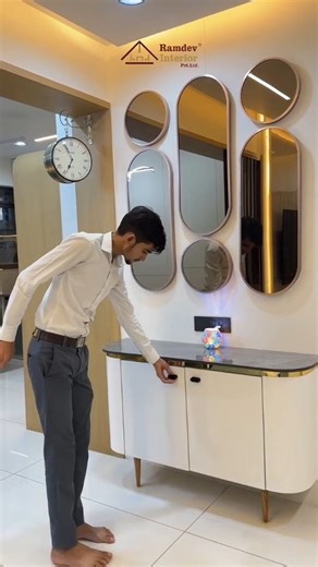 Ramdev Interior pvt ltd on Instagram: "Decorative storage unit adding character to the living area ✨ . . . Contact detail : 📞 Call Now: +91 96620 57046 📍 D-202 Ramdev Interior Pvt Ltd Ganesh Galory 11, Ahmedabad, India 🌐 www.ramdevinterior.in 📩 DM for Free Site Visit & Quotation ✨ Let’s Design Your Dream Home – Hassle-Free & On-Time Delivery #RamdevInterior #AhmedabadInteriorDesigner #InteriorDesignIndia #HomeTourIndia #VillaInteriorDesign ModernHomeDecor BudgetFriendlyDesigns 3BHKInterior v