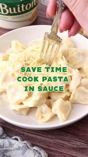 ⏲ TIME SAVING TIP! ⏲ Cook BUITONI pasta in sauce for a quicker meal! 🙌 You’ll need: 9 oz BUITONI Three Cheese Tortellini 15 oz BUITONI Alfredo Sauce Water BUITONI Shredded Parmesan Cheese Directions: PLACE BUITONI Alfredo Sauce in a medium skillet over medium heat. Fill Alfredo container 1/2 way with water and add to sauce. Stir well. ADD BUITONI Three Cheese Tortellini to sauce mix. Cook at least 7 minutes or until pasta is tender. SERVE with BUITONI Shredded Parmesan Cheese. | Buitoni USA
