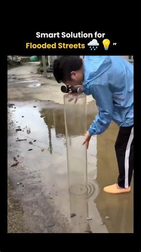 worldlogy.in on Instagram: "In this clip, a small portable water suction gadget is used to clear rainwater from a flooded road by channeling it directly through a pipe system. 🚰 It works like a mini water pump, creating suction pressure that draws the water in and redirects it safely — a simple yet effective example of engineering for real-world issues. 🌍 Imagine scaling this idea for cities — no more clogged streets, just smart flood-management tools powered by innovation. ⚙️ #InnovationInAct