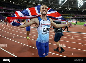 Great Britain's Daniel Talbot celebrates after winning gold in the Men's 4x100m Relay during day nine of the 2017 IAAF World Championships at the London Stadium. Picture date: Saturday August 12, 2017. See PA story ATHLETICS World. Photo credit should read: Martin Rickett/PA Wire. RESTRICTIONS: Editorial use only. No transmission of sound or moving images and no video simulation Stock Photo - Alamy