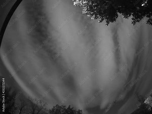 Time lapse of clouds and stars that move around the pole , taken with special mono camera.