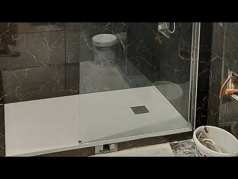 How to install a shower enclosure or fixed wall on a shower tray. ALTERNA