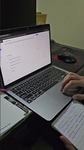 Candidate Hides Book Under Desk During Test