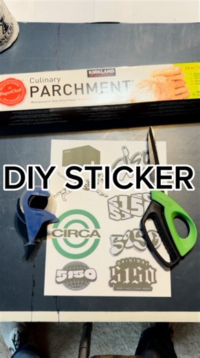 5150 on Instagram: "Here is the easiest way to make custom stickers using just tape and parchment paper. What you’ll need: * Hand-drawn or printed designs * Clear packing tape * Parchment paper * Scissors The Steps: 1. Prep your art: Draw or print your design and cut it out. 2. Create the base: Lay down a piece of parchment paper and cover it with a layer of clear tape. 3. Layer it up: Place your design on top of that tape, then cover it with a second layer of tape. 4. Seal it: Press down firmly