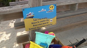 Toy collection boxes at beach are Boy Scout's idea to help others, environment