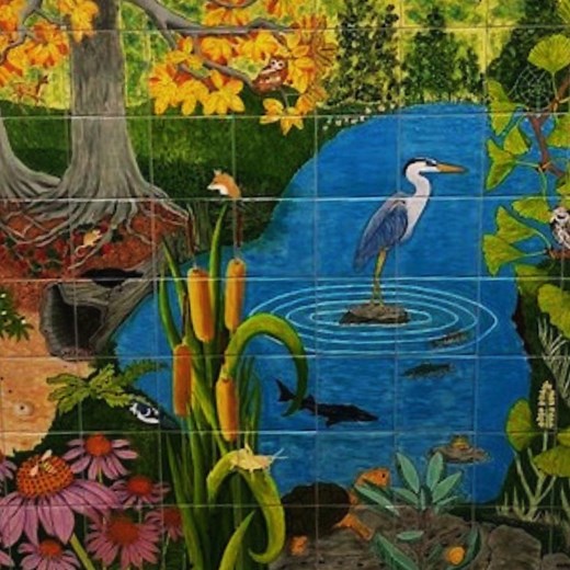 THE WHOLE WORLD IS A LIBRARY The second tile mural created by Canandaigua artist Barbara McPhail is complete and it is beautiful!! Take a minute to admire her work located in the stairwell between the 2nd and 3rd floor. The mural design is a landscape illustrating many of the native species on land and in water found in the Finger Lakes and NY State. The mural is supported by a New York State Council on the Arts grant. | Wood Library