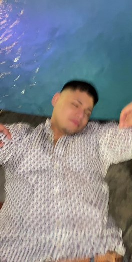 Diving Fun in the Pool at Night