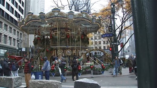 A giant double-decker carousel opened on Friday between Penn Station and the Empire State Building in Greeley Square. | ABC7NY