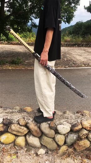 Craftsman Forging a Katana Sword