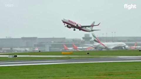 Retro-Style Livery Takes Off from Rainy Manchester Airport