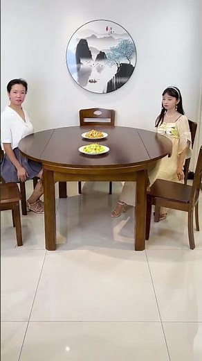 This is an extendable round solid wood dining table