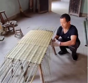 Man uses bamboo as a commodity. | Media 4