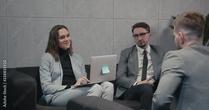 HR managers interviewing male job employee, have positive first impression of candidate, happy employers listen to applicant at interview excited of candidature. Recruitment concept. 4K UHD