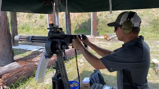 The M134 Minigun is an American 7.62×51mm NATO six-barrel rotary machine gun with a high rate of fire (2,000 to 6,000 rounds per minute). It features a Gatling-style rotating barrel assembly with an external power source, normally an electric motor. The “Mini” in the name is in comparison to larger-caliber designs that use a rotary barrel design, such as General Electric’s earlier 20 mm M61 Vulcan, and “gun” for the use of rifle ammunition as opposed to autocannon shells. | Gun Talk