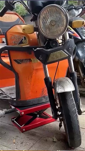 Make motorcycle maintenance easier with the Motorcycle Lift Scissor Jack — built with durable steel and a wide anti-slip platform for stable support. Easy to operate with a crank handle, compact for any garage setup. Made in China | MOQ: 5 pcs #MotorcycleTools #LiftJack #GarageEquipment #B2BWholesale #GlobalTrade | Zylo Cui
