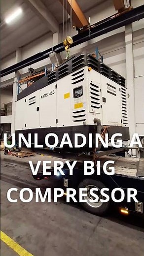 Unloading a VERY BIG compressor from a truck