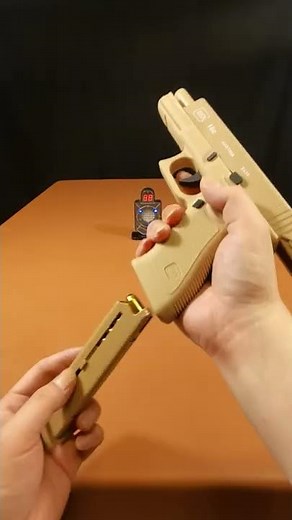 Glock / Colt Automatic Shell ejection pistol