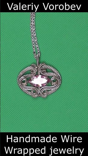 Soft pink sparkle, wrapped in metal lace ✨ Handcrafted wire wrap pendant by Valeriy Vorobev.