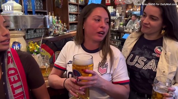 USA soccer fans celebrate first goal against Wales in World Cup.