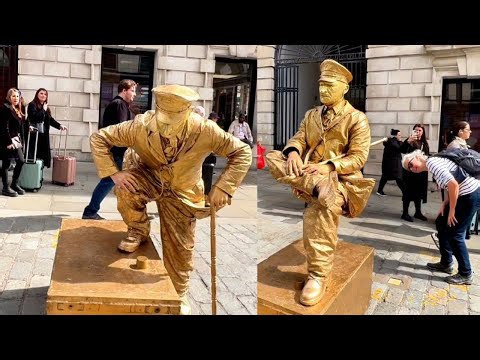 How London Levitating Goldman Statue works hard to entertain people.#livingstatue #floating #art