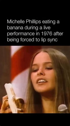Artists Without Autotune on Instagram: "Follow (us) @artistswithoutautotune for the best singing content on the gram! 🎙️ 🎤 Michelle Phillips In 1976, during a live television performance with The Mamas & the Papas, Michelle Phillips found a subtle but unforgettable way to protest being forced to lip-sync—by calmly eating a banana on stage mid-performance. What looked playful on the surface was actually a quiet act of defiance, a reminder that real musicians live for authenticity, not playback.