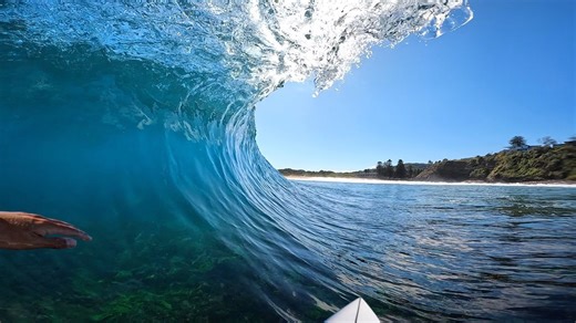 Surfing a Shallow Left-Hand Reef Break