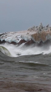 Watch the seagulls play over massive waves on Lake Superior. Freezing temperatures create unique ice formations on the cliffs and coat the trees with 8-12" of ice. Strong NE winds make 14-20' waves crashing into the North Shore of Minnesota. Feel free to share! #lakesuperior #EdmundFitzgerald #SUPERIOR #Michigan #Wisconsin #Minnesota #greatlakes #canada #photographer #wave | Tone Coughlin Photography LLC
